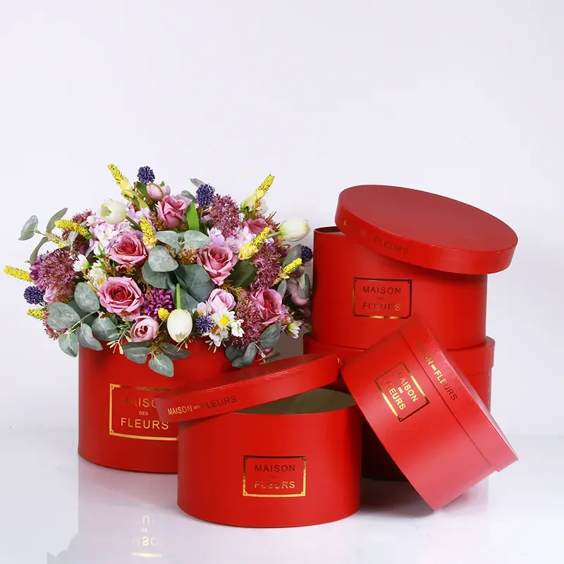 Tragbarer runder Blumenkasten rot.webp